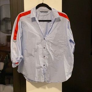 Button down shirt with red sleeve detail